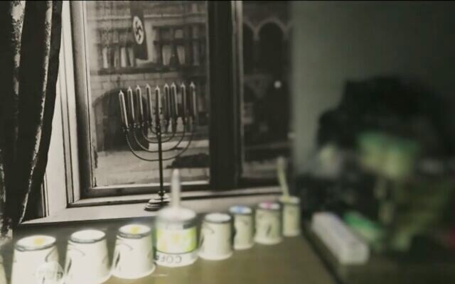 Footage of the makeshift Hanukkiah used by six Israeli hostages to mark the holiday with an image in the background of a similarly reserved celebration in Nazi Germany. (Uvda/Channel 12)
